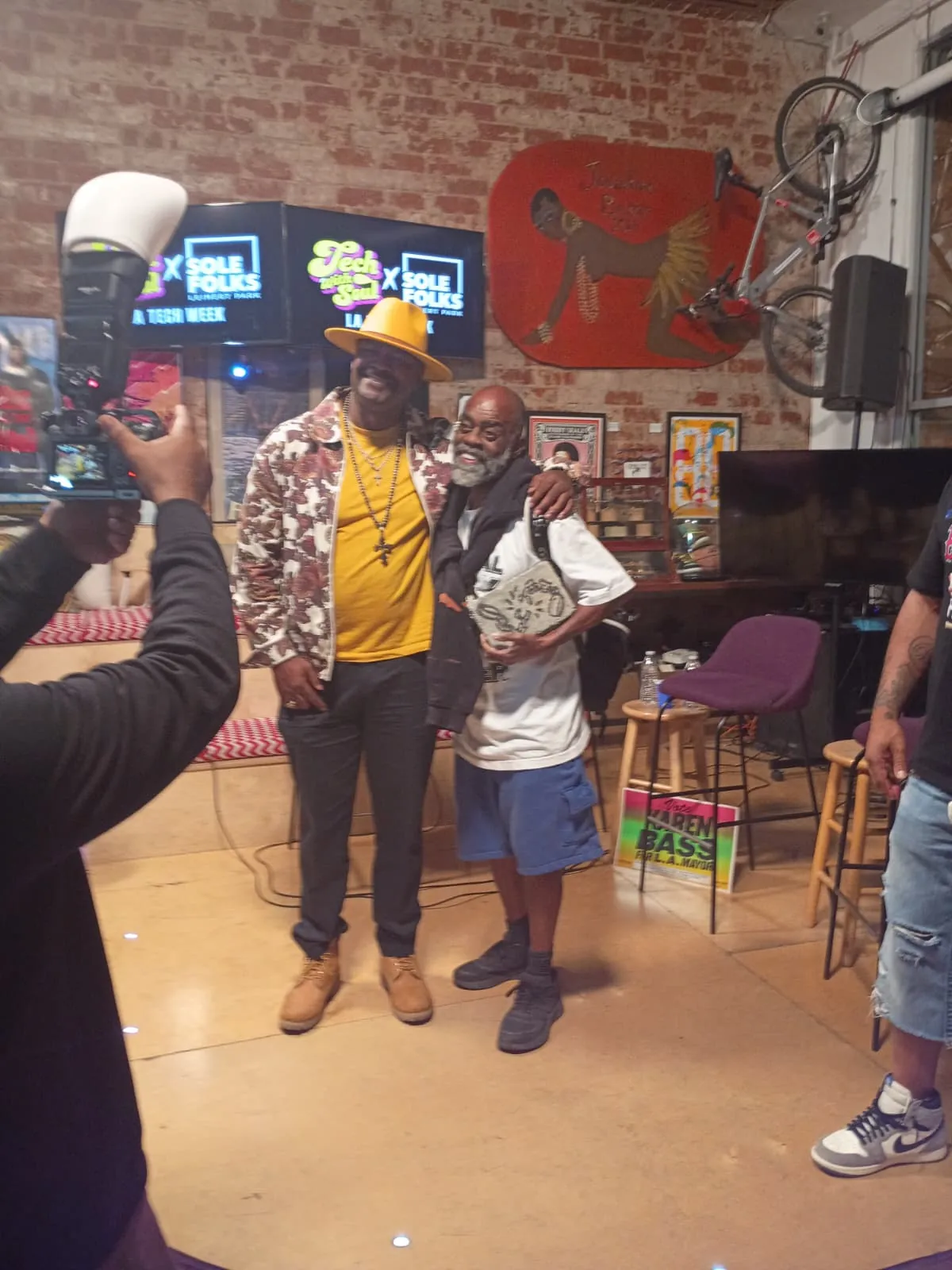 Two guests photographed by the camera crew